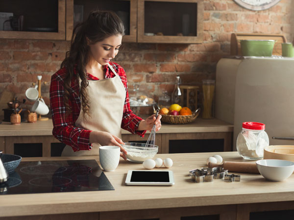 women baking in a kitchen