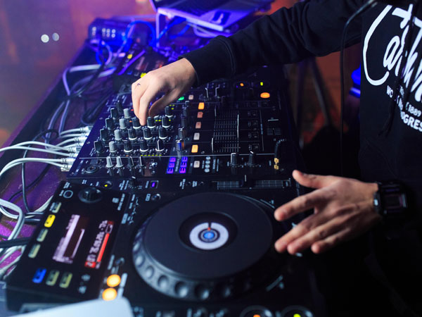 Dj's hands working turntable