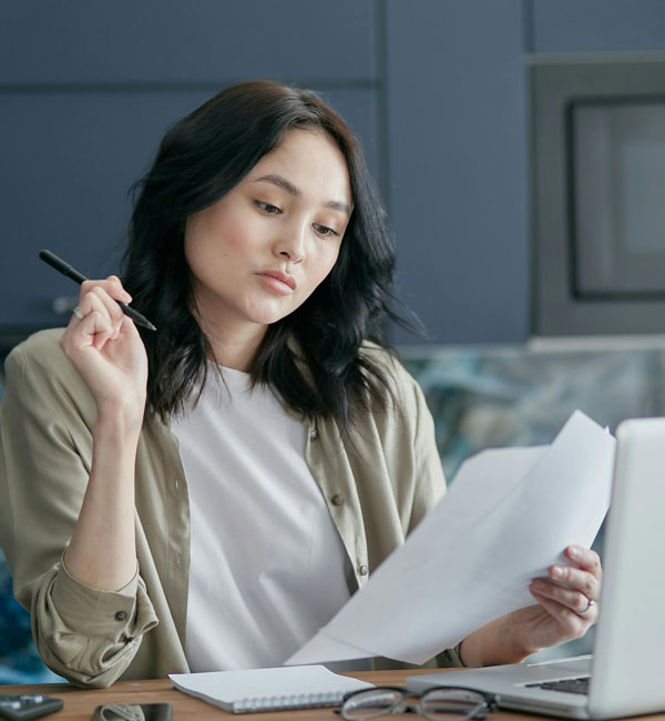women thinking while looking at policy