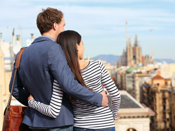 A couple looking out over scenic village